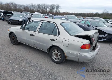1999 Toyota Corolla Ve из США, поврежденный, VIN 2T1BR12E1XC128924